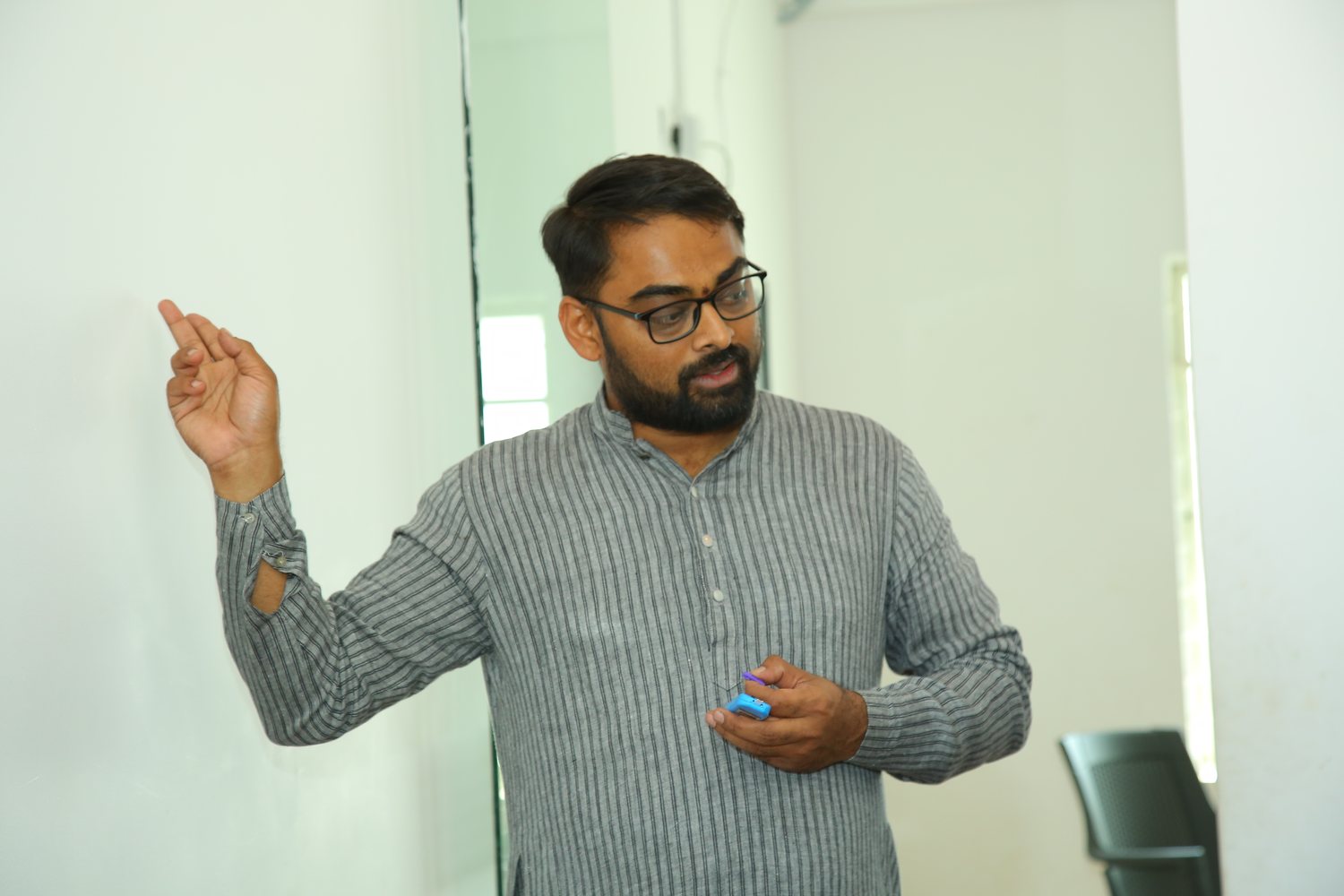 Explaining a reading at the camp — Dr Varun Murthy