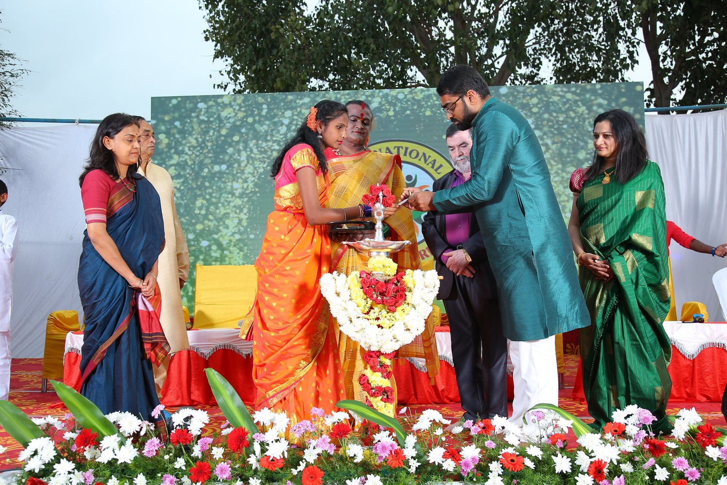 Lighting the lamp at Noble International School — Dr Varun Murthy