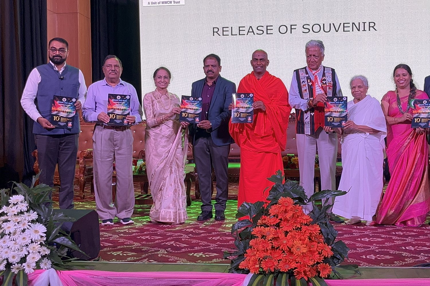 Releasing the seminar souvenir with the swamiji and Padma awardees — Dr Varun Murthy
